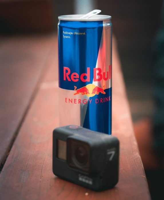 Red Bull can and GoPro camera as part of a co-marketing brand partnership