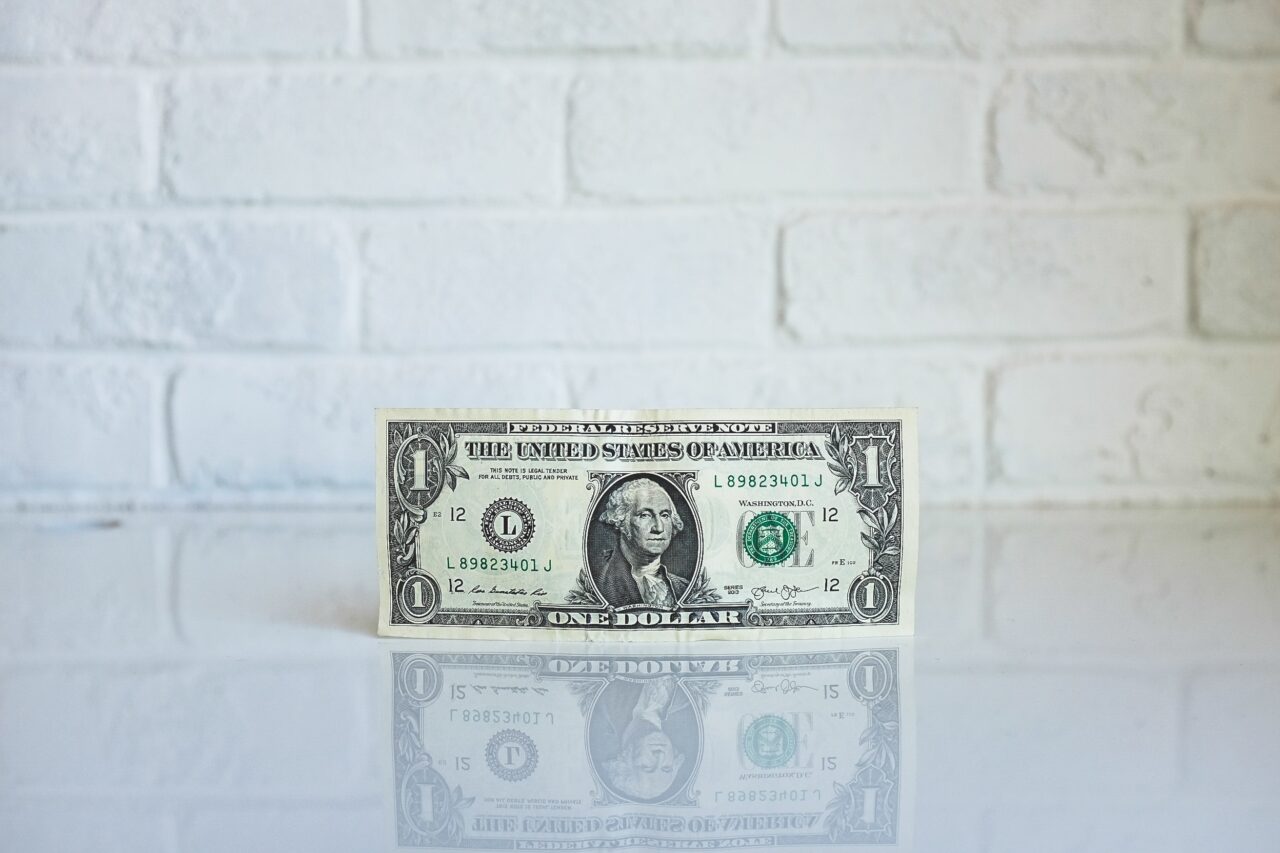 Dollar bill from freelancer client contract fees