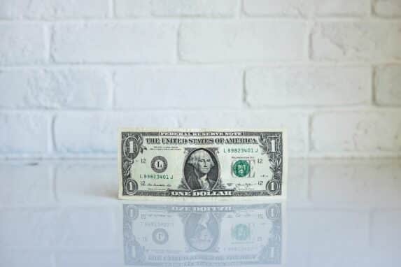 Dollar bill from freelancer client contract fees